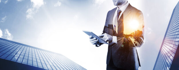 Holding,Tablet,Business.,Businessman,Analyzing,Economic,Growth,Graph,Chart,And